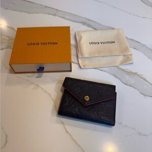 Louis Vuitton victorine wallet in empreinte leather in navy